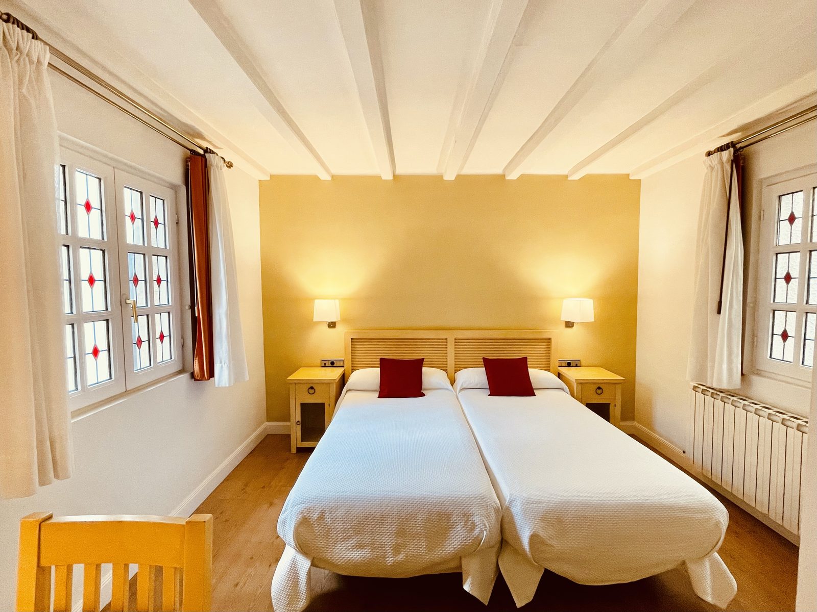 Chambre double avec deux lits simples