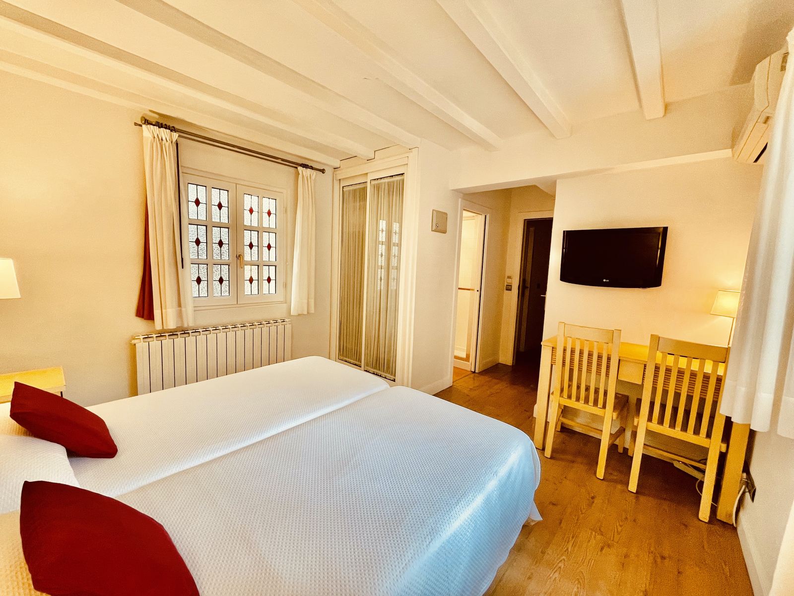Chambre double avec deux lits simples